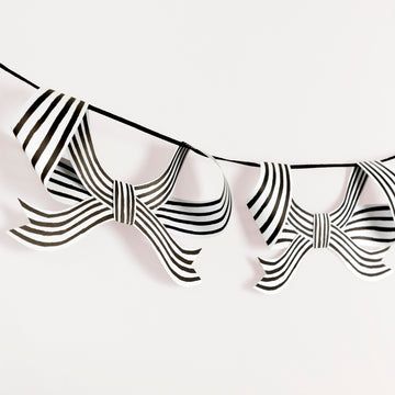 Black and white striped bows on a white background