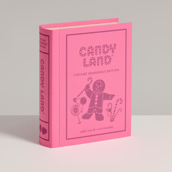 Pink 'Candy Land' vintage bookshelf edition on a gray background