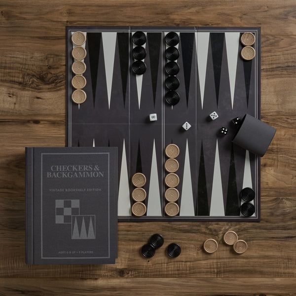 Checkers and backgammon board with pieces on a wooden surface