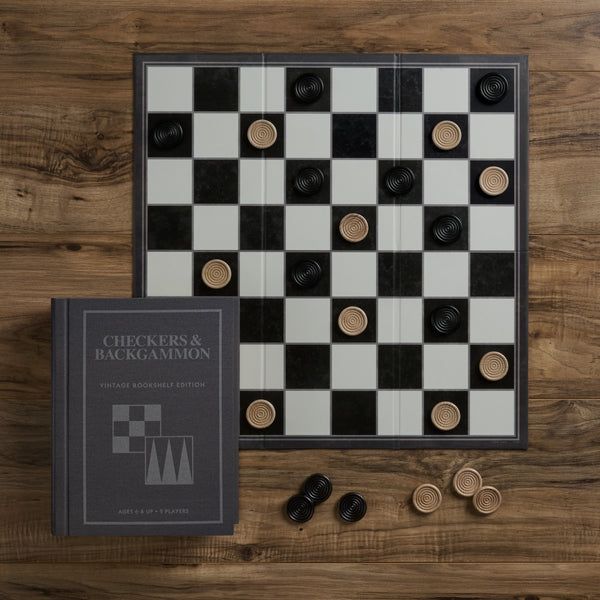 Checkers and backgammon board with pieces on a wooden surface
