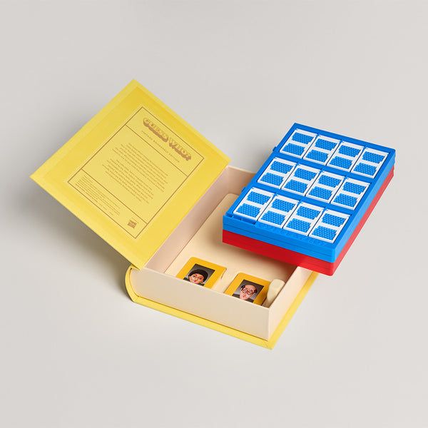 Yellow box with a blue and red grid puzzle on a light gray background