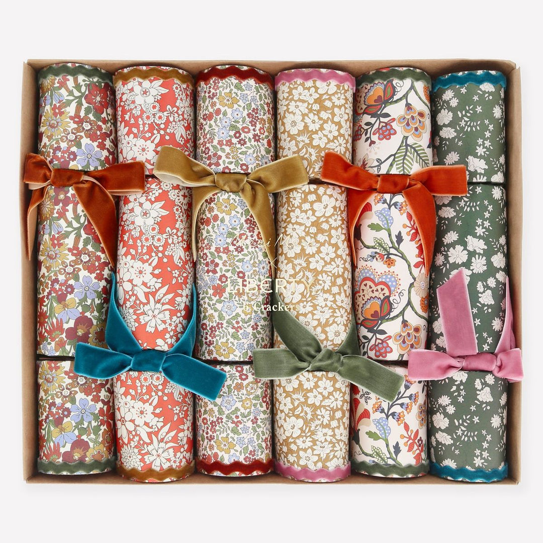 Set of floral-patterned crackers with colorful bows in a box