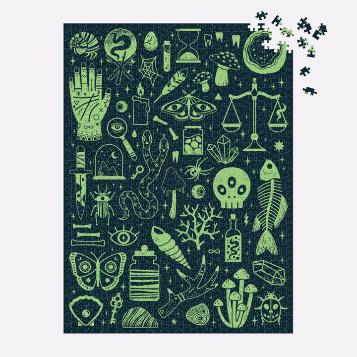 Jigsaw puzzle with green symbols on a dark blue background