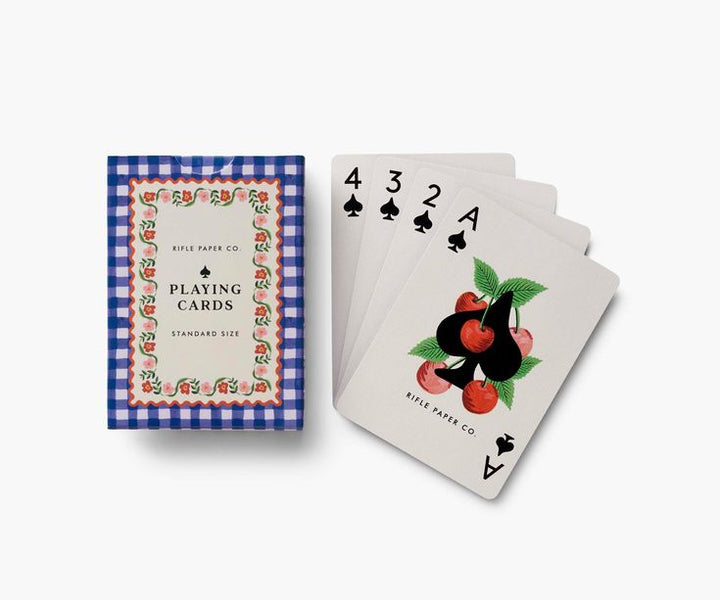 Playing cards with a decorative box on a white background