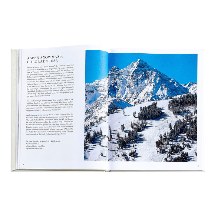 Open book showing a snowy mountain landscape with text on the left page.