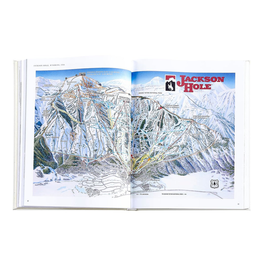 Open book showing a map of Jackson Hole with mountain scenery