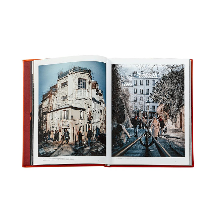 Open book showing two photographs of a city street with people on a white background