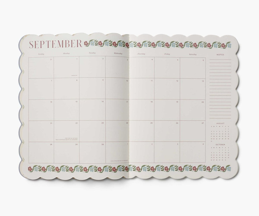 Calendar pad with September on a white background