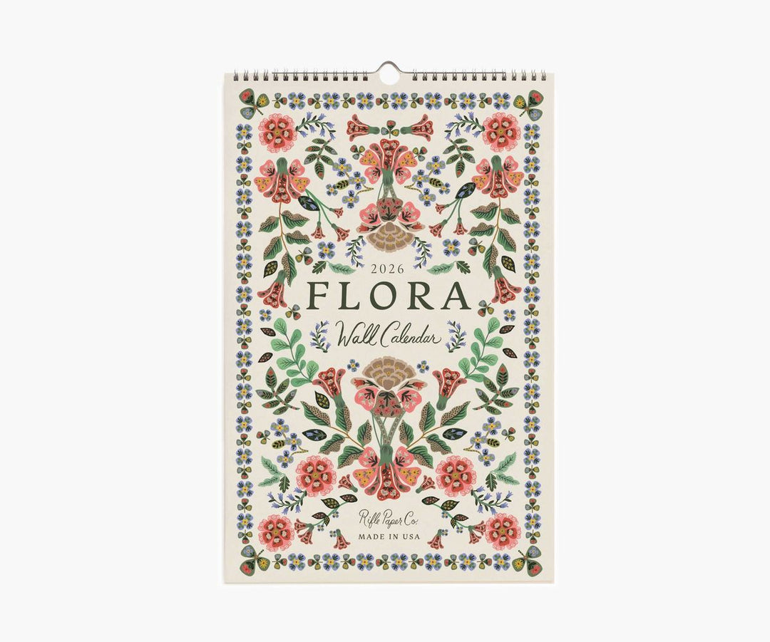 Floral wall calendar with decorative design on a white background
