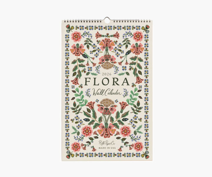 Floral wall calendar with decorative design on a white background
