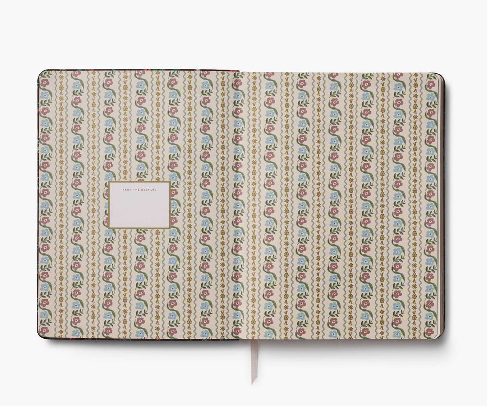 Patterned notebook with a white label on a white background