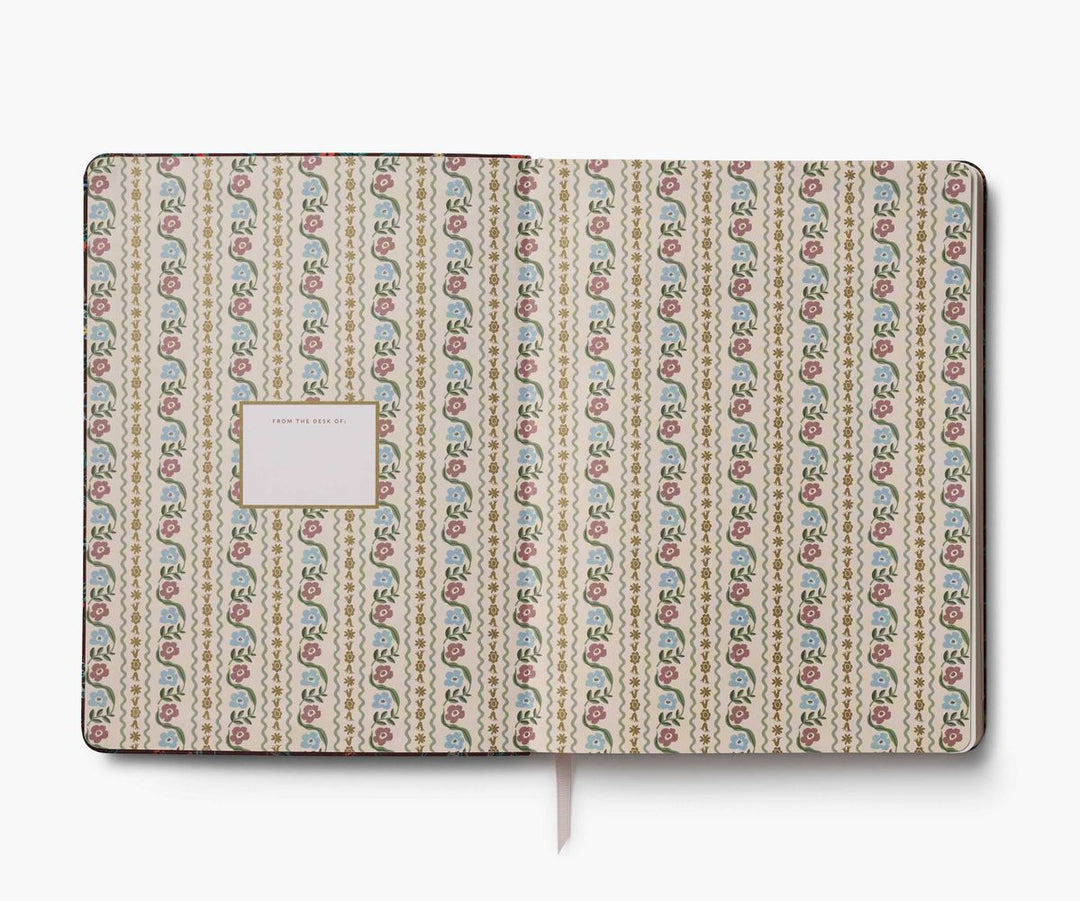 Patterned notebook with a white label on a white background