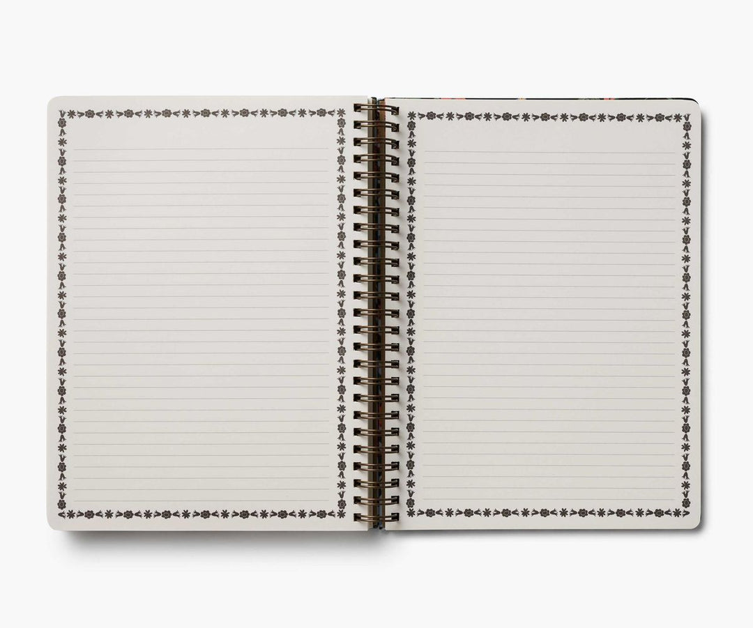 Open notebook with lined pages on a white background