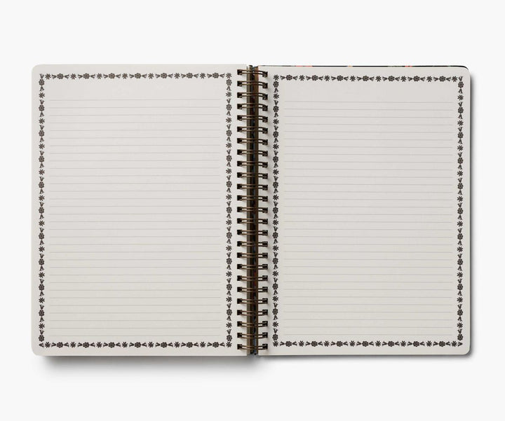 Open notebook with lined pages on a white background