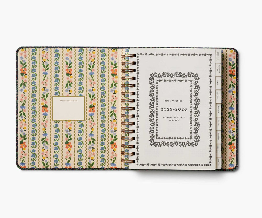 Floral patterned planner with 2025-2026 date range on a white background