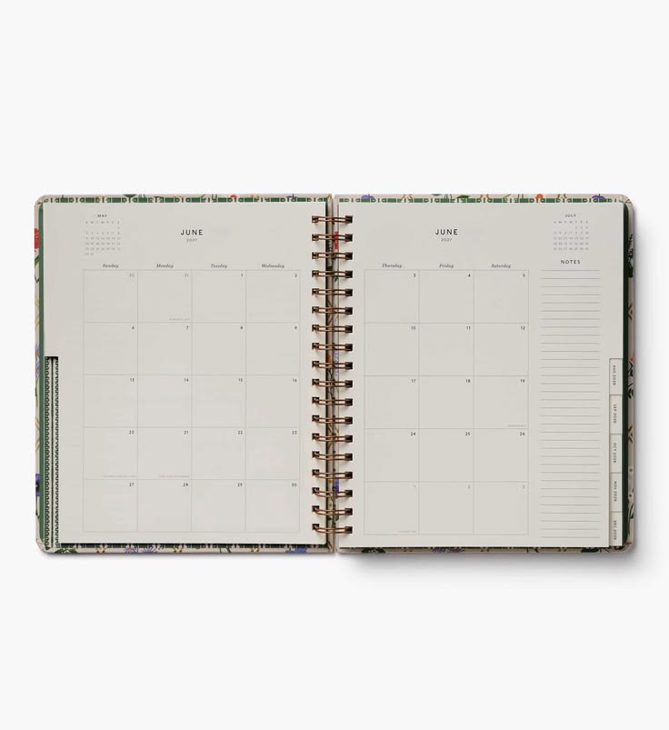 Open planner with monthly view on a white background