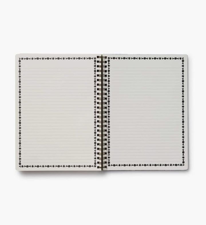Open notebook with lined pages on a white background