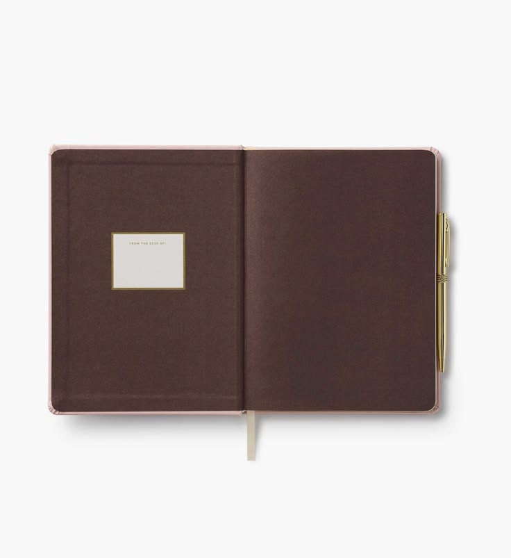 Brown notebook with a gold pen on a white background