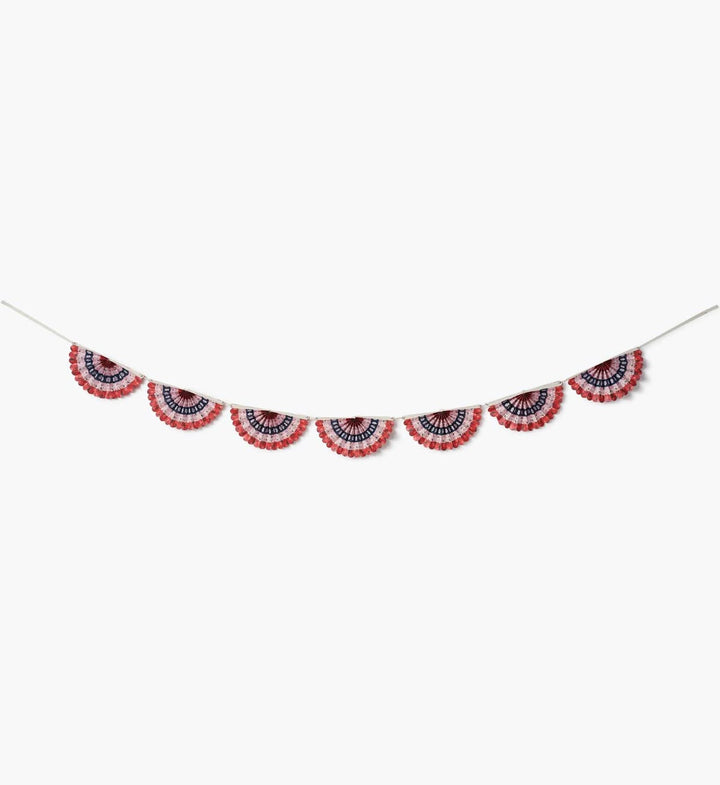 Decorative banner with red, white, and blue pattern on a white background