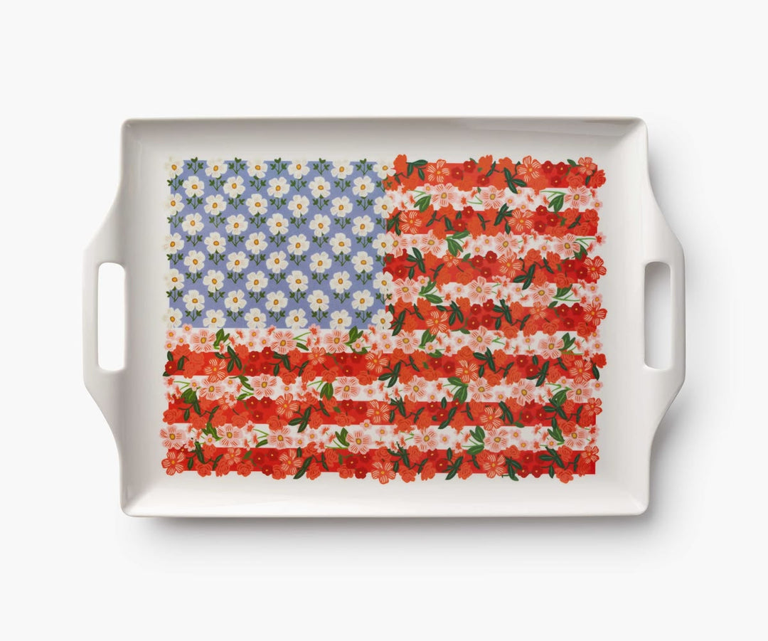 Decorative tray with floral design resembling an American flag on a white background