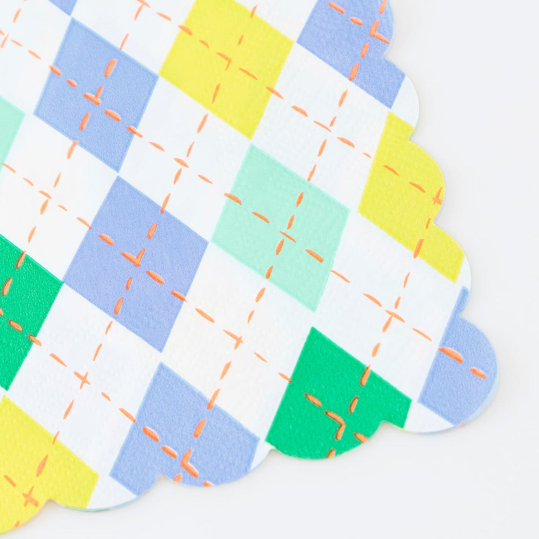Colorful patchwork pattern with geometric shapes on a white background