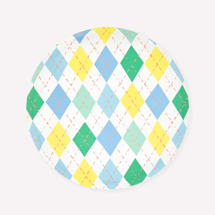 Round cushion with a colorful diamond pattern on a white background