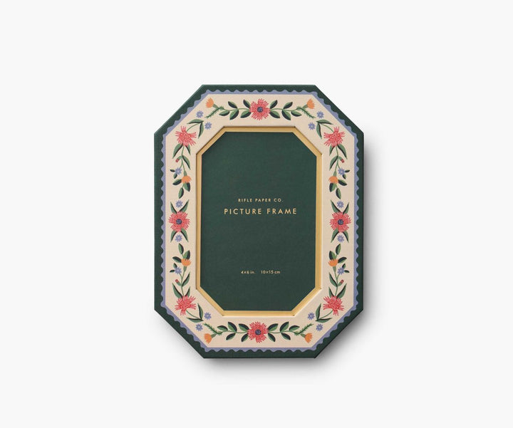 Decorative picture frame with floral design on a white background