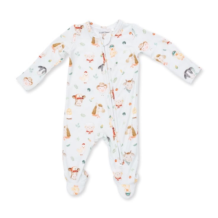 A baby footed sleeper in a very light blue color, featuring an all-over print of woodland animals including deer, squirrels, and a fox, along with small trees and leaves. The sleeper has long sleeves, a front zipper closure, and is photographed flat against a solid white background.