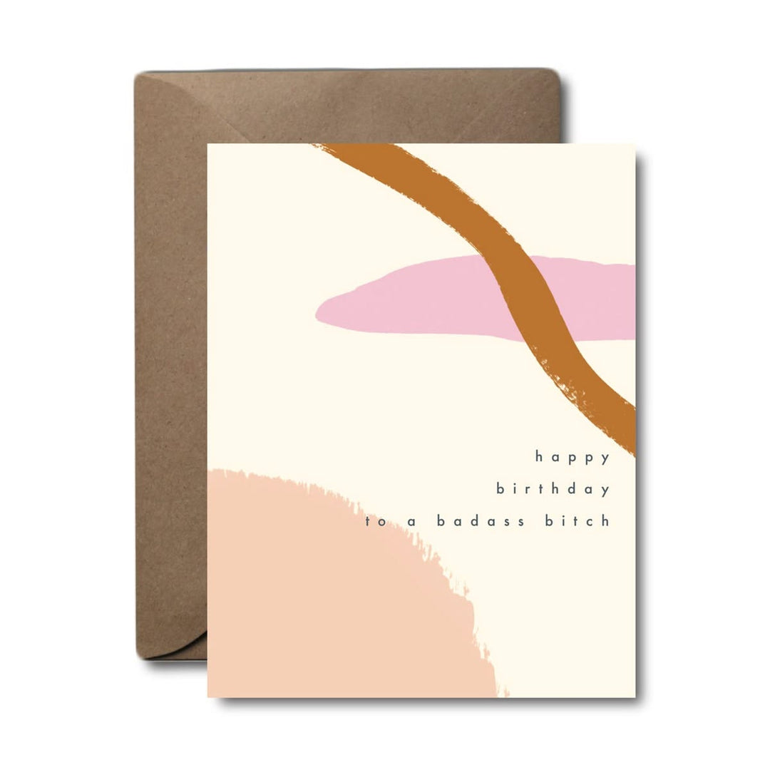 Greeting card with abstract design and text 'happy birthday to a badass bitch' on a white background