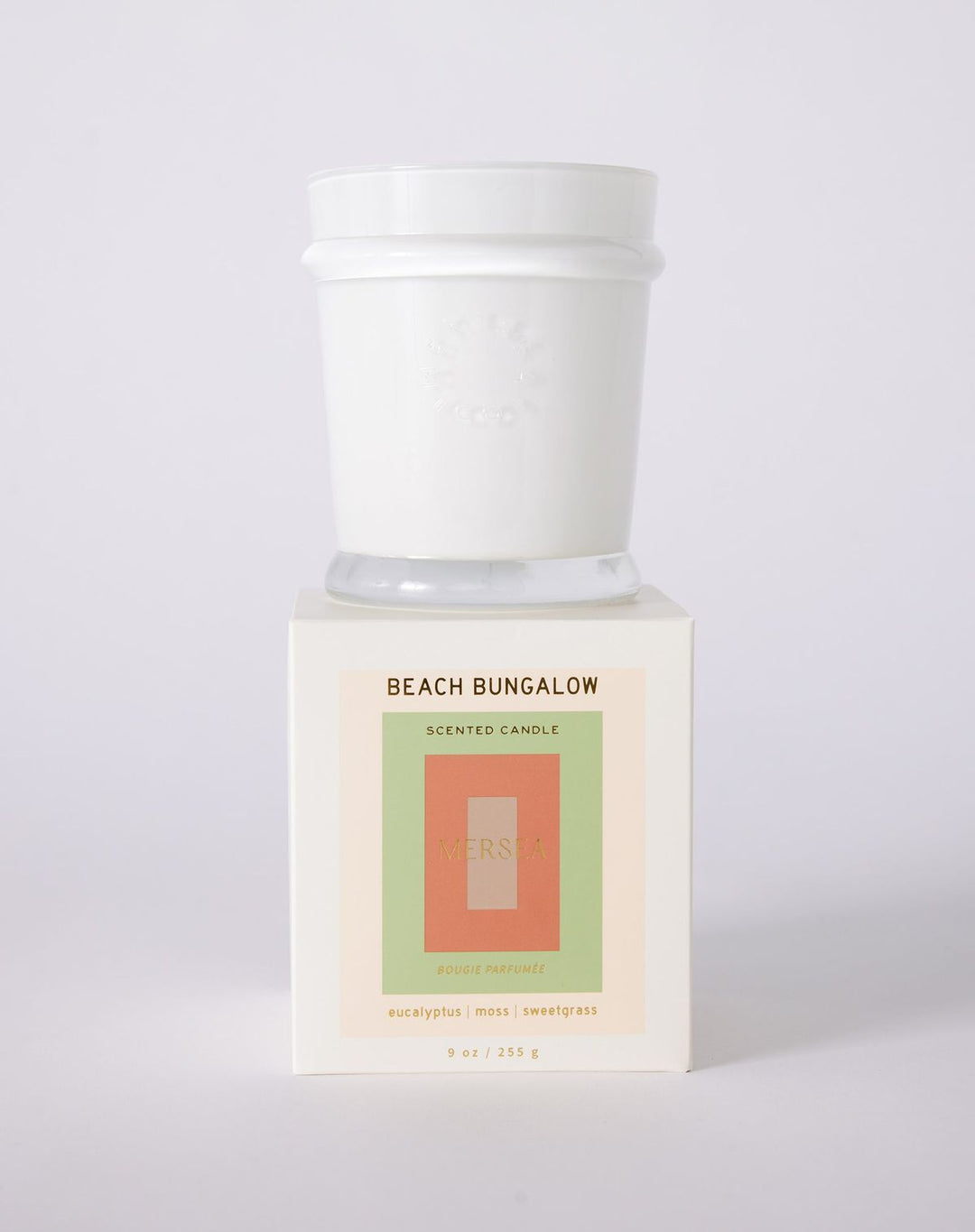 Scented candle labeled 'Beach Bungalow' on a white background