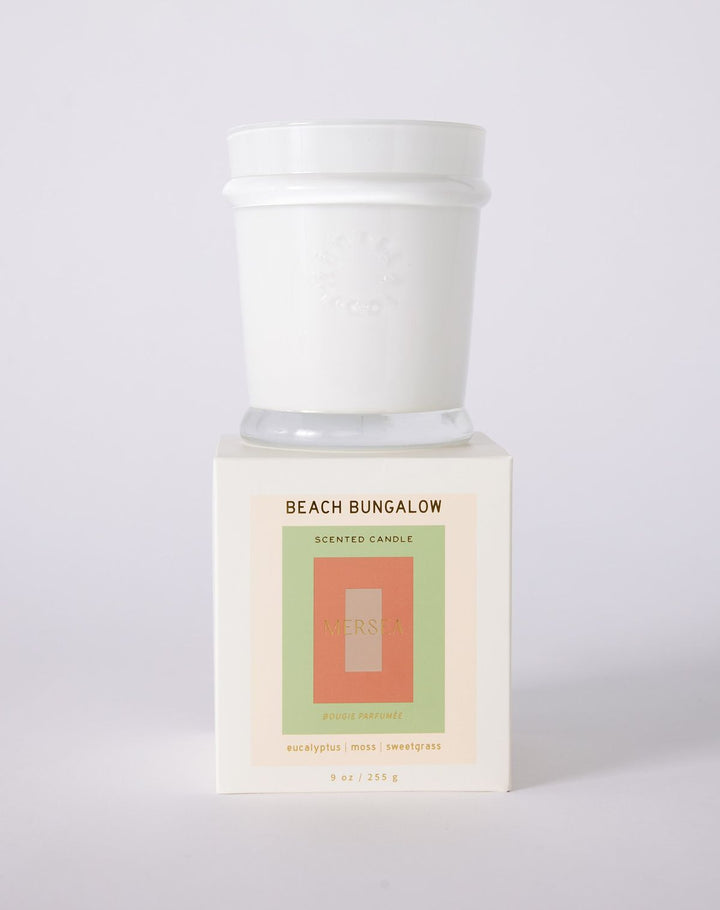 Scented candle labeled 'Beach Bungalow' on a white background