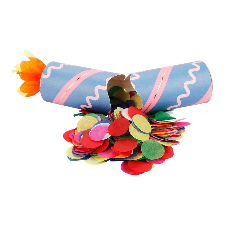 Colorful paper toy with a cylindrical base and circular confetti-like top on a white background