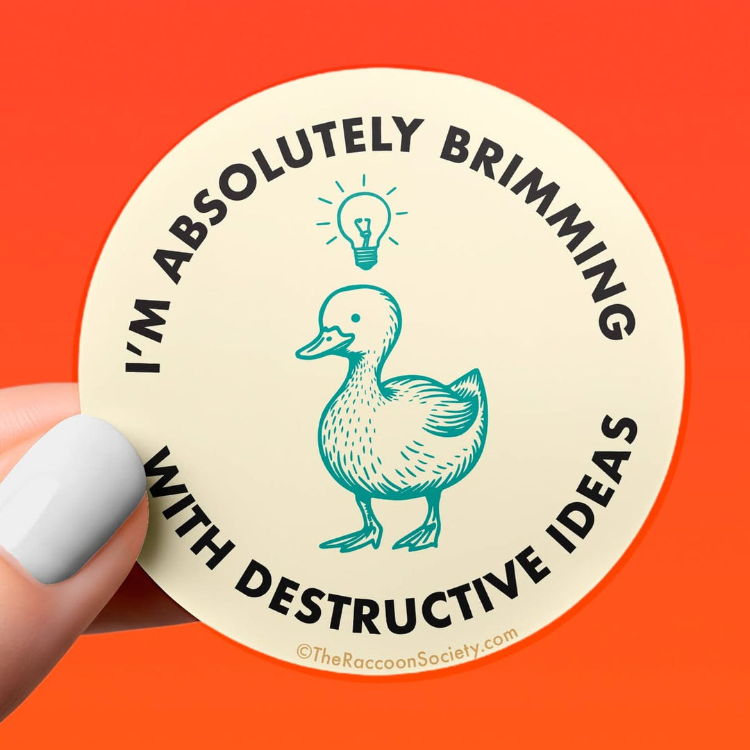 Circular sticker with a duck illustration and text on a red background