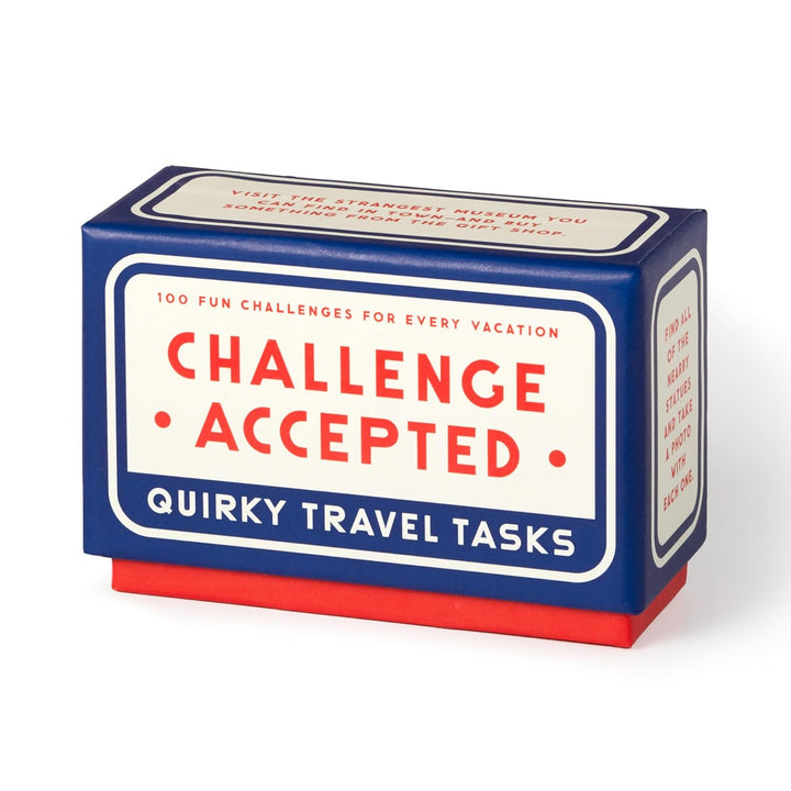 Box of 'Challenge Accepted' quirky travel tasks on a white background
