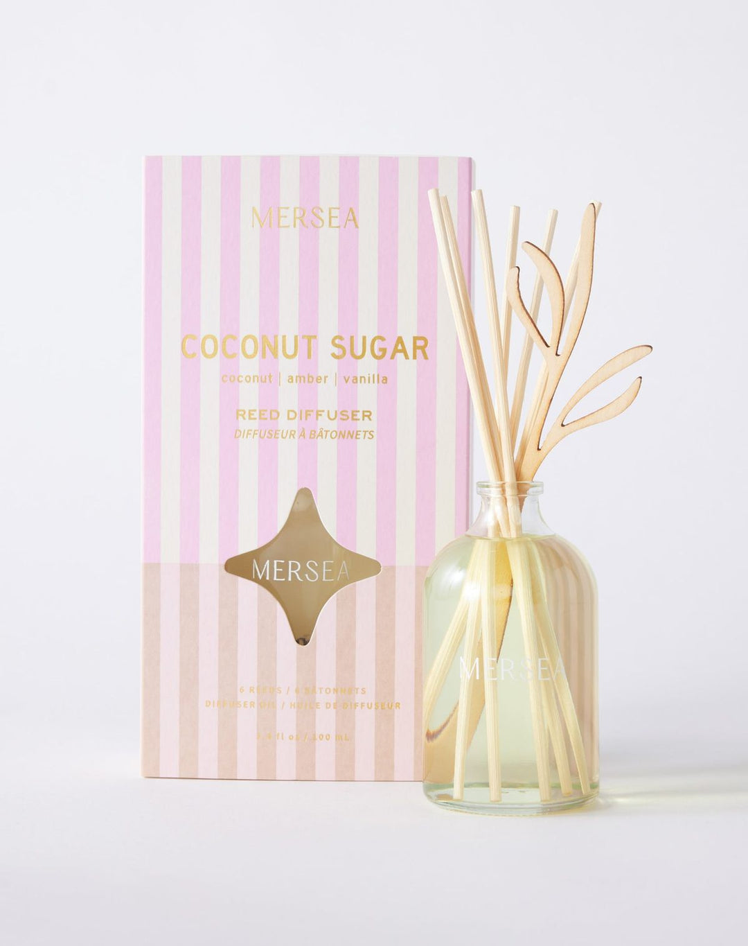 Mersea Coconut Sugar diffuser with packaging on a light background