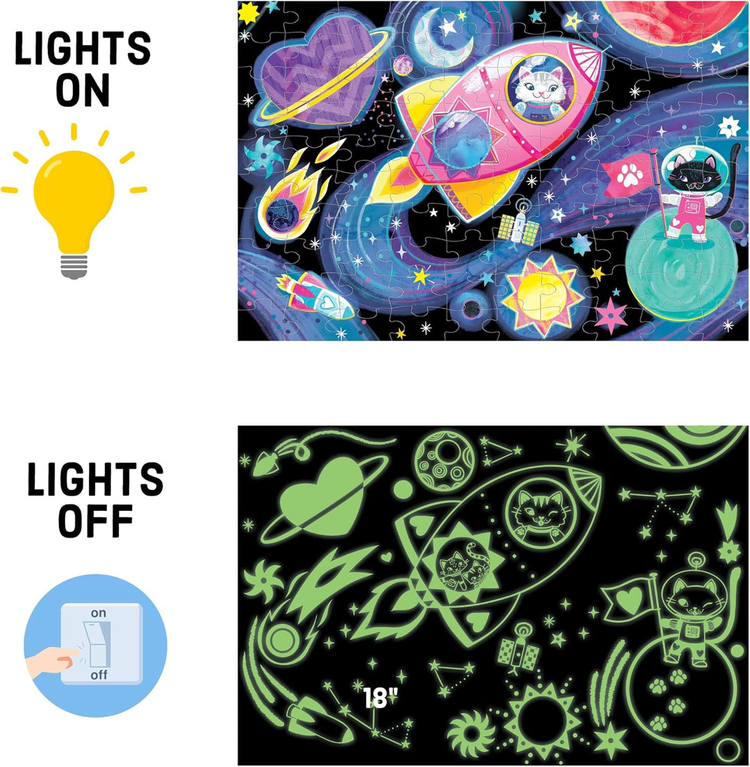 A glow-in-the-dark children's jigsaw puzzle featuring a colorful space theme, shown in two states: fully lit with bright cartoon illustrations on a black background, and unlit with glowing green outlines on a black background. Includes a 'LIGHTS ON' and 'LIGHTS OFF' comparison graphic.