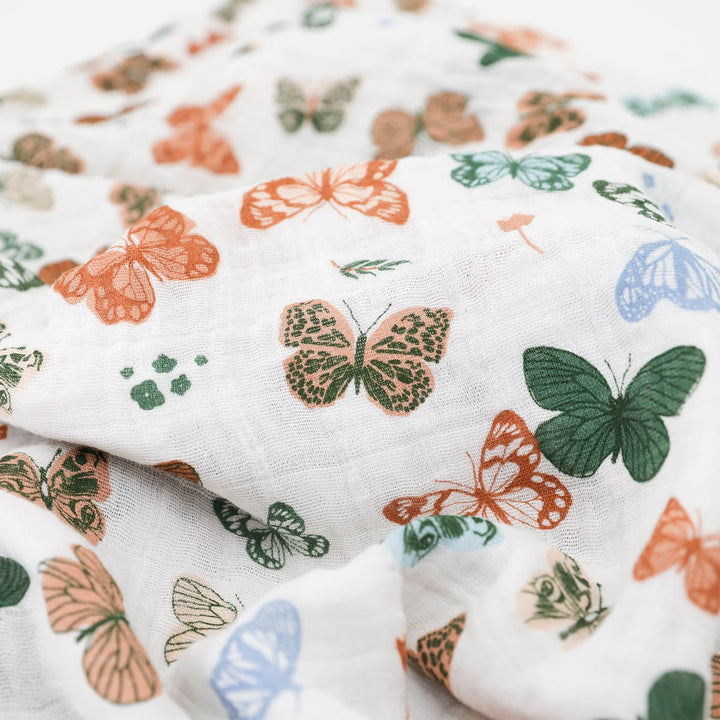 Butterfly patterned fabric with colorful butterflies on a white background