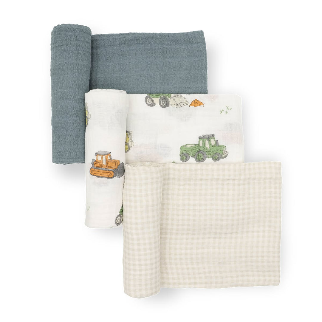 Set of four baby blankets with different patterns on a white background