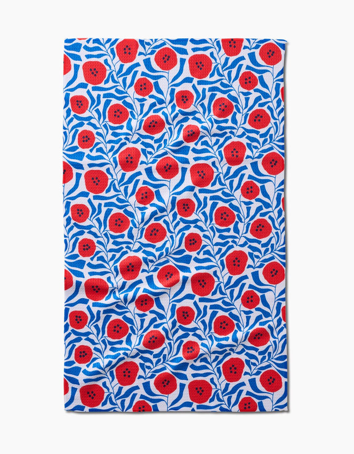 Fabric with red floral pattern on a blue background