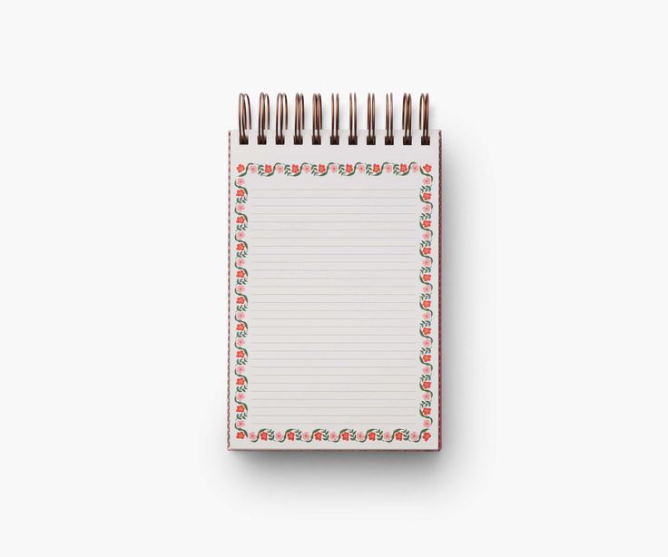 Notebook with decorative border on a white background
