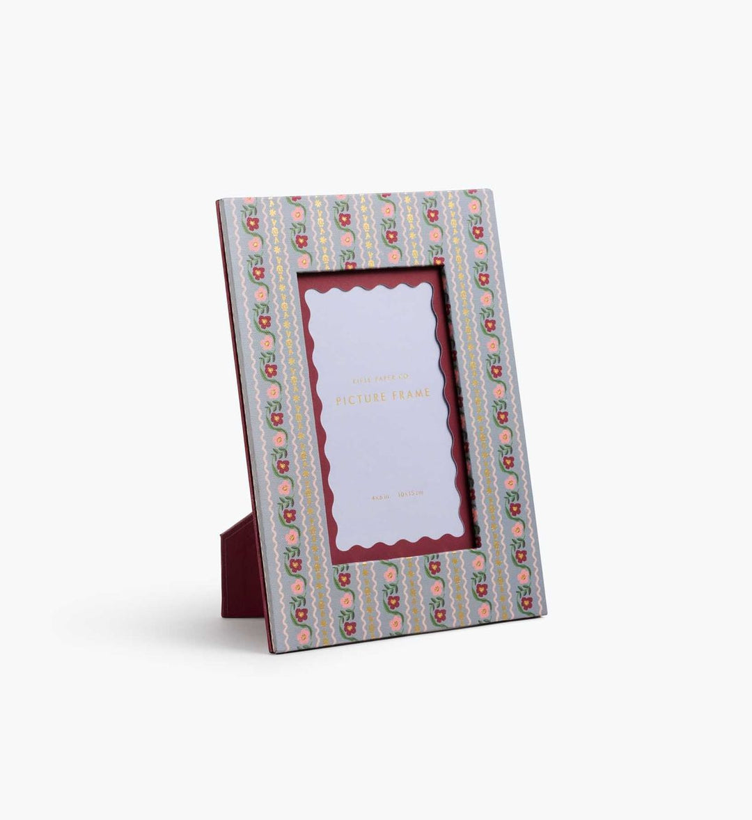 Decorative photo frame with a patterned border on a white background