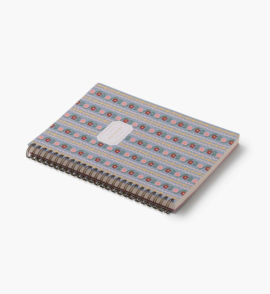 Notebook with a patterned cover on a white background