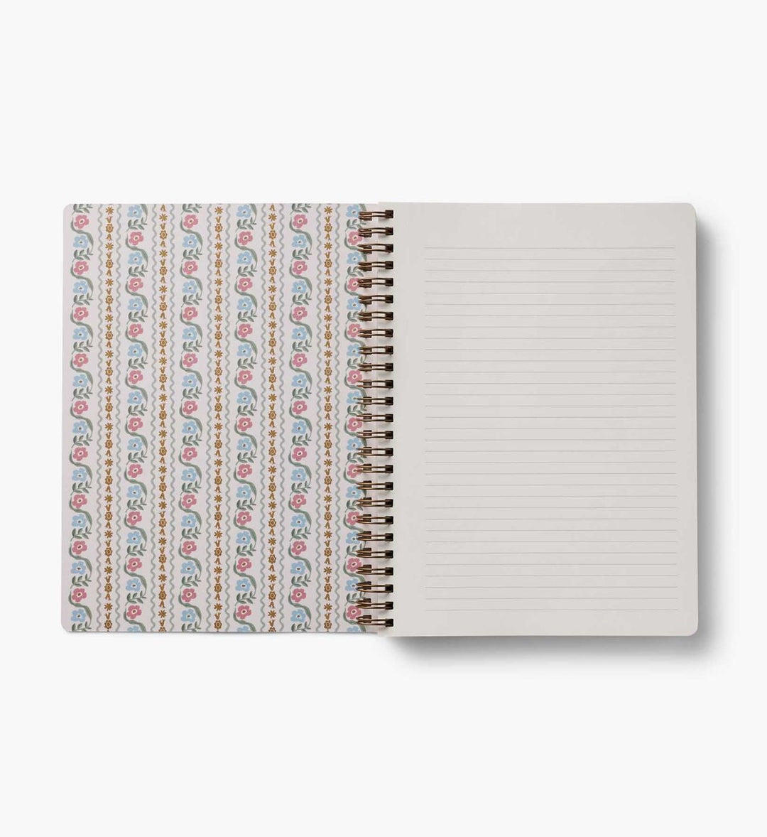 Notebook with patterned cover and plain back on a white background