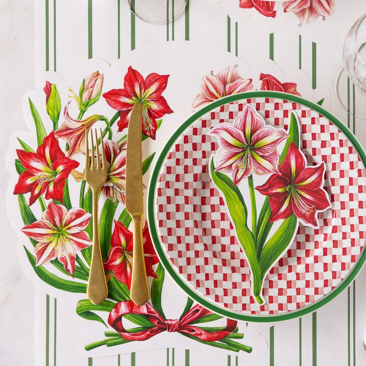 Floral-themed placemat with a plate, cutlery, and ribbon on a white background