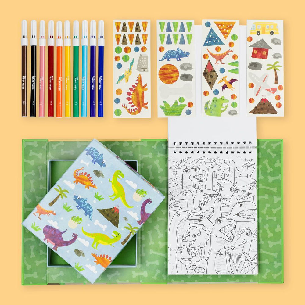 Coloring book, stickers, and pencils on a yellow background