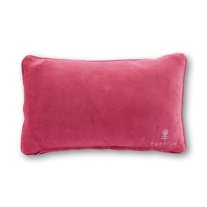 Pink pillow with a brand logo on a white background