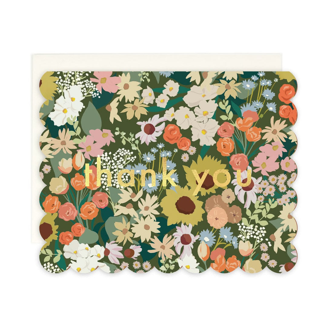 Floral card with 'thank you' text on a white background