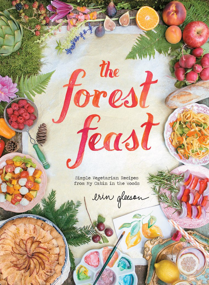 Book cover of 'The Forest Feast' with colorful food illustrations and vibrant text.