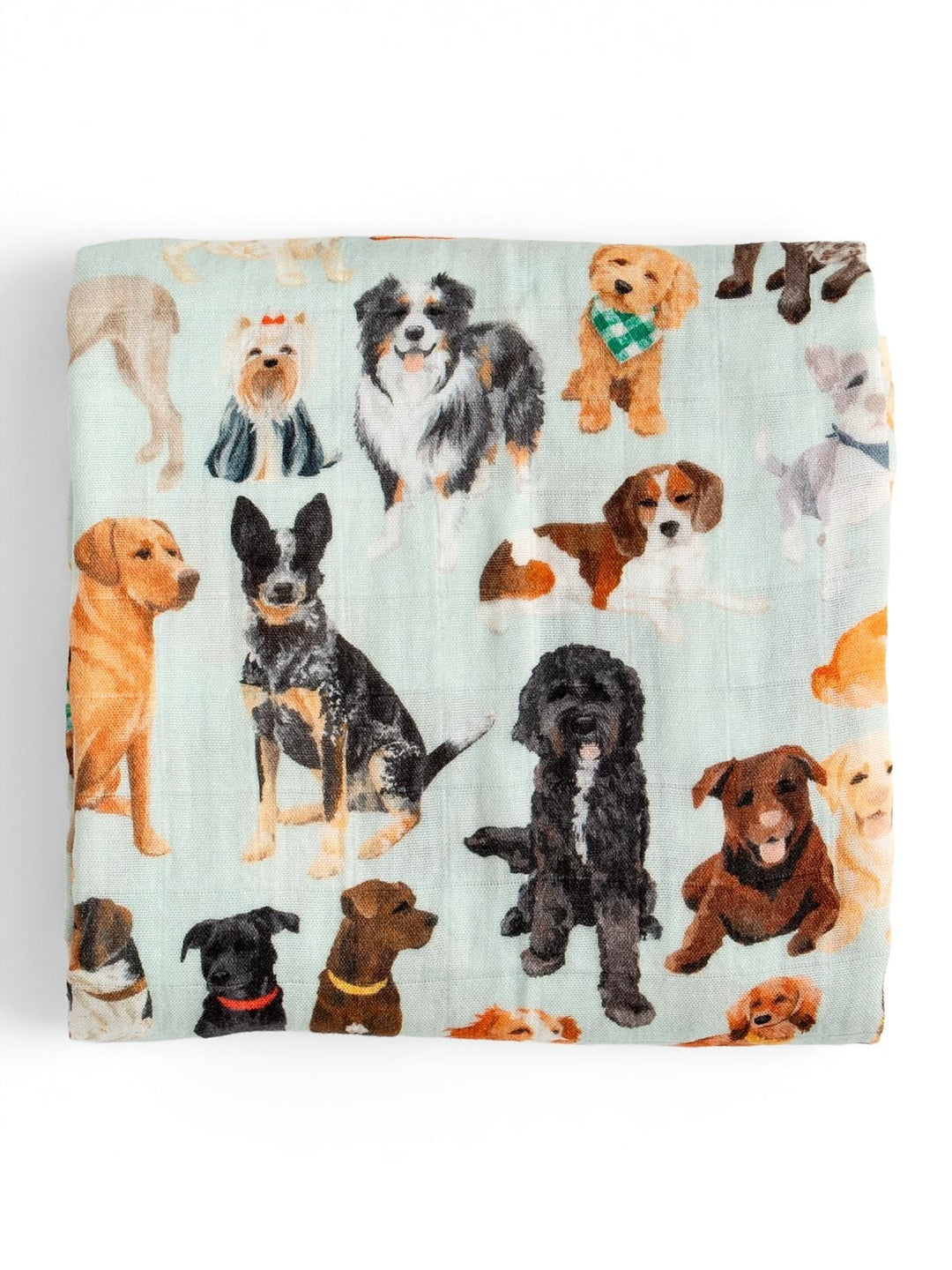 A square fabric item, likely a baby blanket or swaddle, featuring a colorful print of various dog illustrations on a pale mint green background.