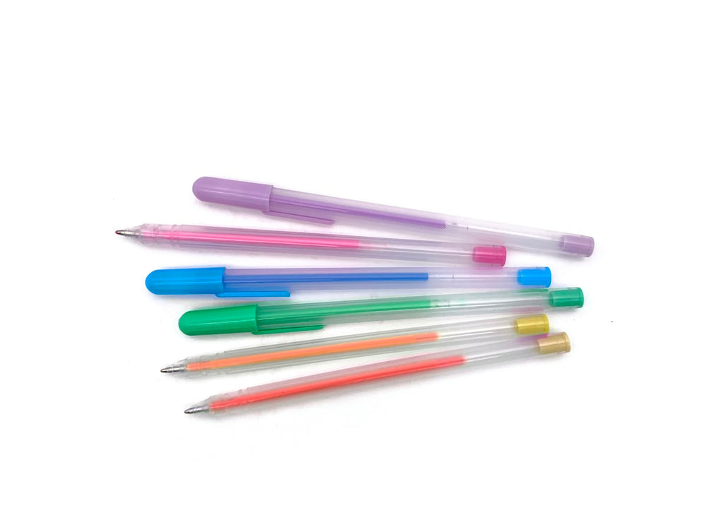 Set of colorful pens with transparent bodies on a white background